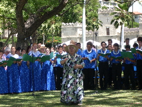 Nola A. Nahulu with choir